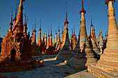 Inle Lake Myanmar. Indein, on the summit of a hill the  Shwe Inn Thein Paya a cluster of hundreds of ancient stupas. Many of them are ruined and overgrown with bushes. 